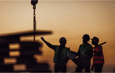 construction men talking about a project | Stonefish Investments, LLC | Commercial Real Estate In New Hampshire